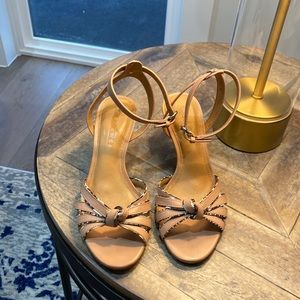 Leather Coach shoes. Leopard print accents